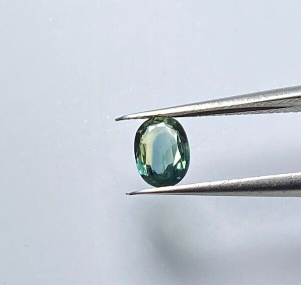 0.82 CTS HEATED MADAGASCAR BLUE/GREEN SAPPHIRE, OVAL CUT 6.5 X 5 X 2.8 MM VVS