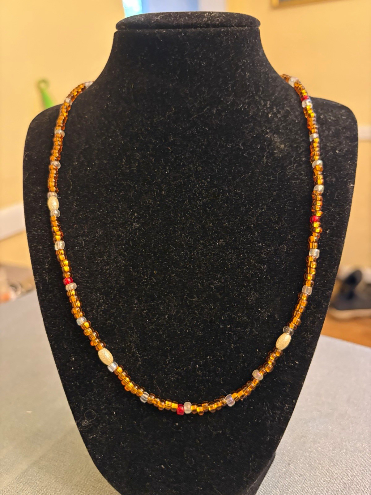 Necklace- Pearls, Brown, Red and glass Beads With A Lobster Clasp. $9 201/2