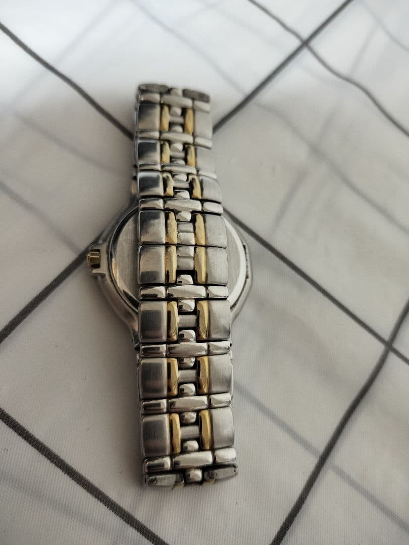 Men’s Yves Saint Laurent watch, two-tone, working condition.