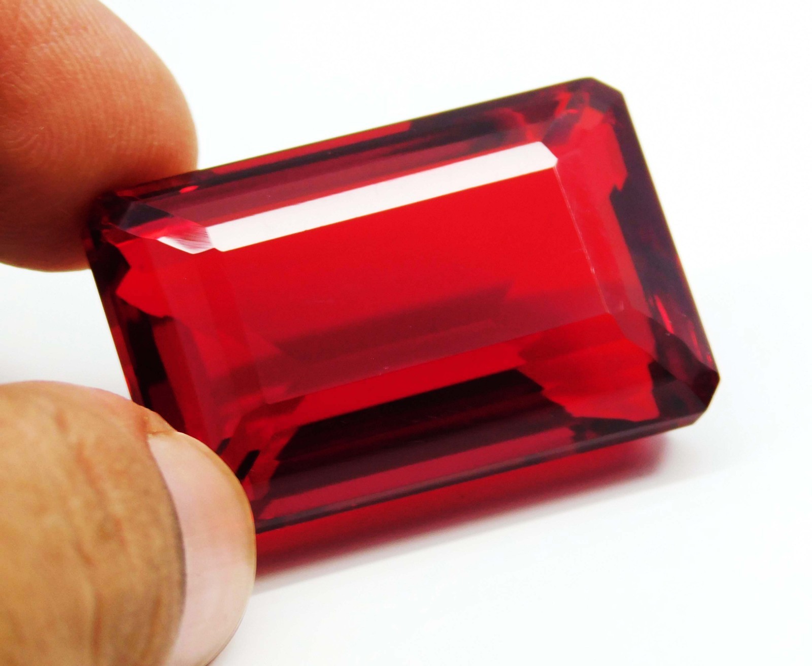 197.60ct. Natural Certified Brazilian Emerald Cut Translucent Red Topaz gemstone