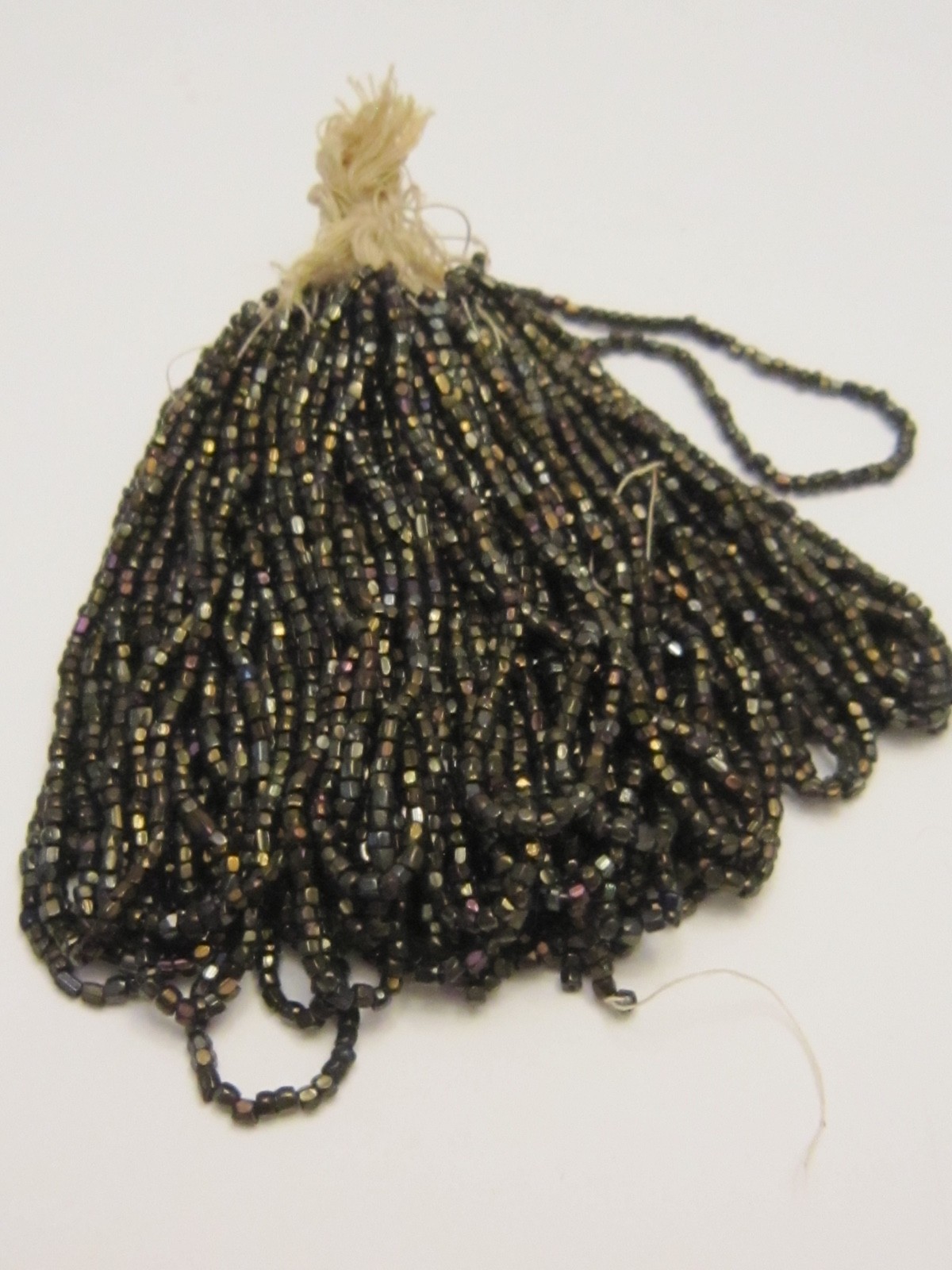 Hank Czech vintage dark topaz lustre faceted micro seed glass beads