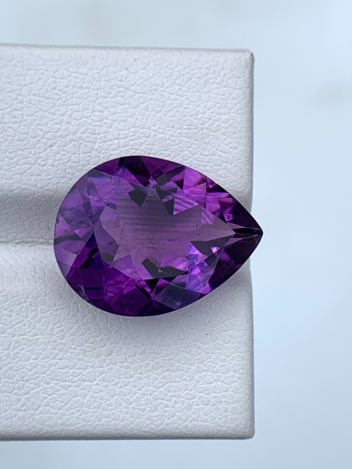 amethyst gemstone with an excellent cut grade and eye-clean clarity grade