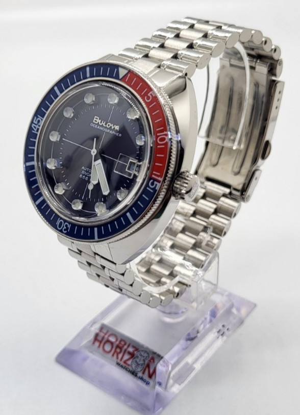 Bulova – Oceanographer, Stainless Steel Blue Bezel Men’s Automatic 96B477