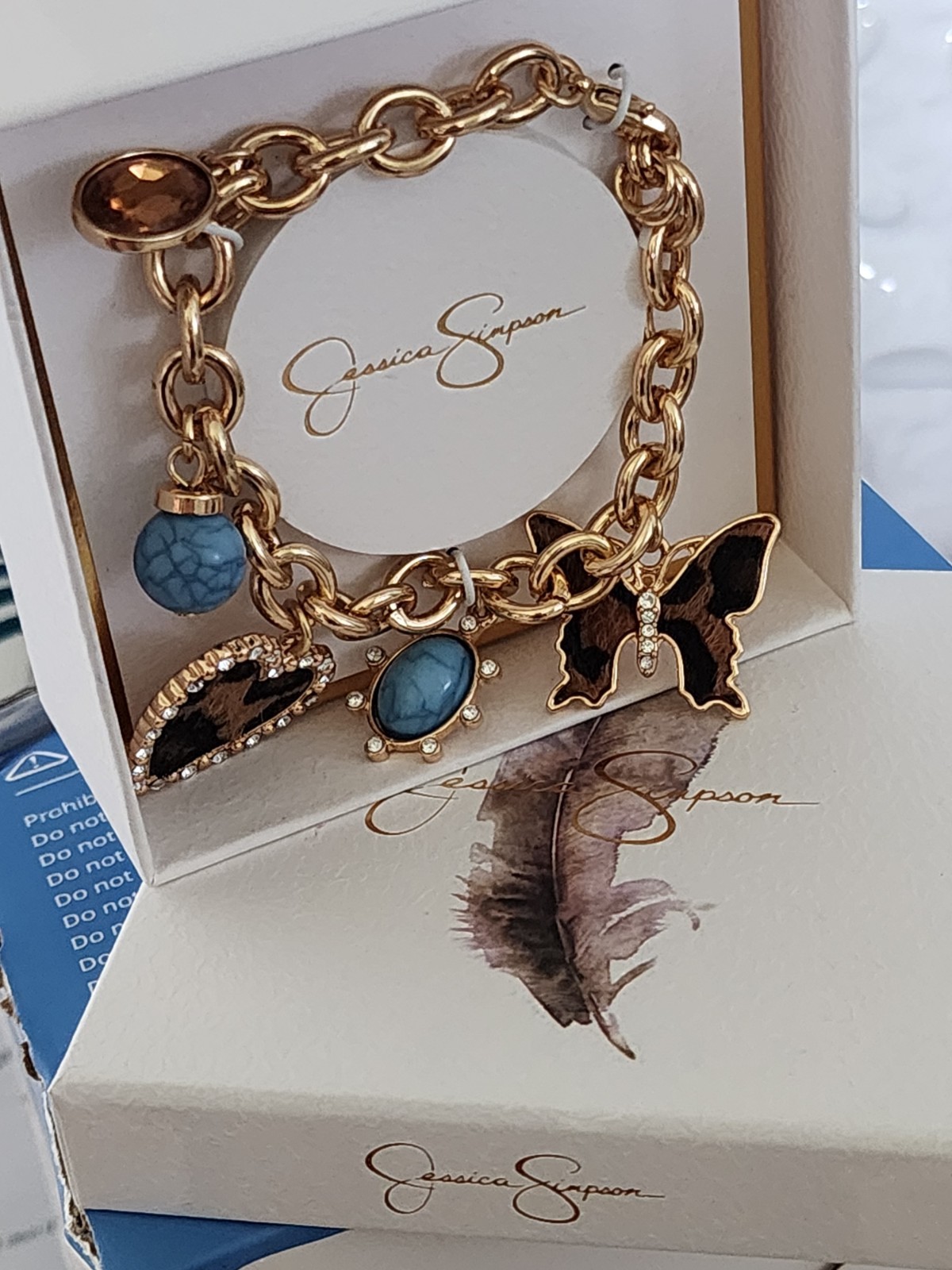 Jessica Simpson Gold Tone Charm Bracelet Blue Crystals Heart Butterfly