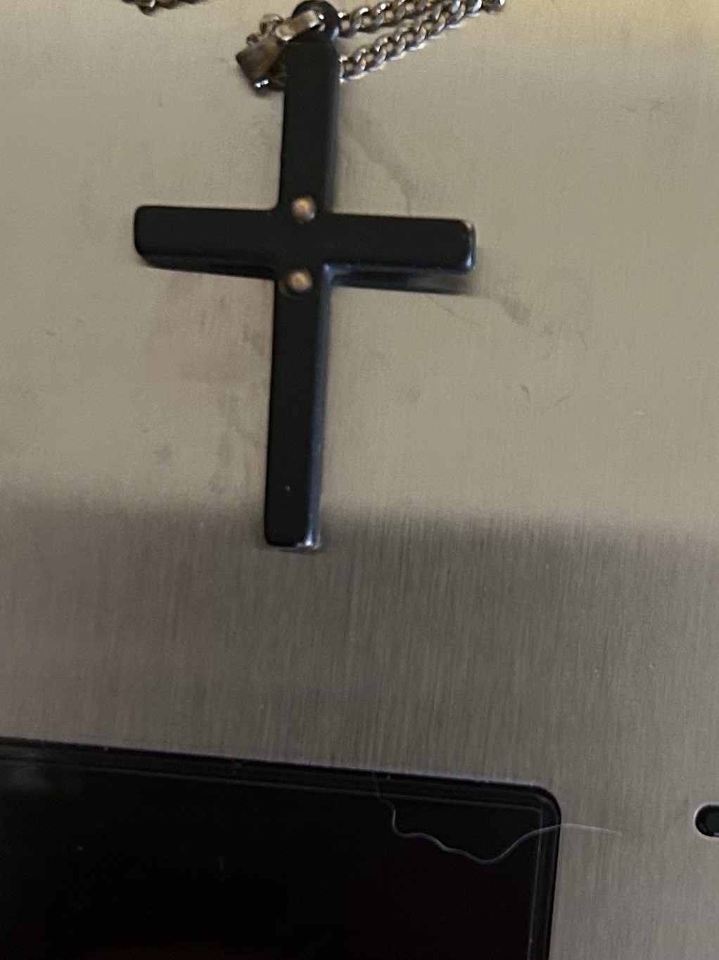 Black Hills Gold cross necklace, featuring a black powder-coated cross 9in