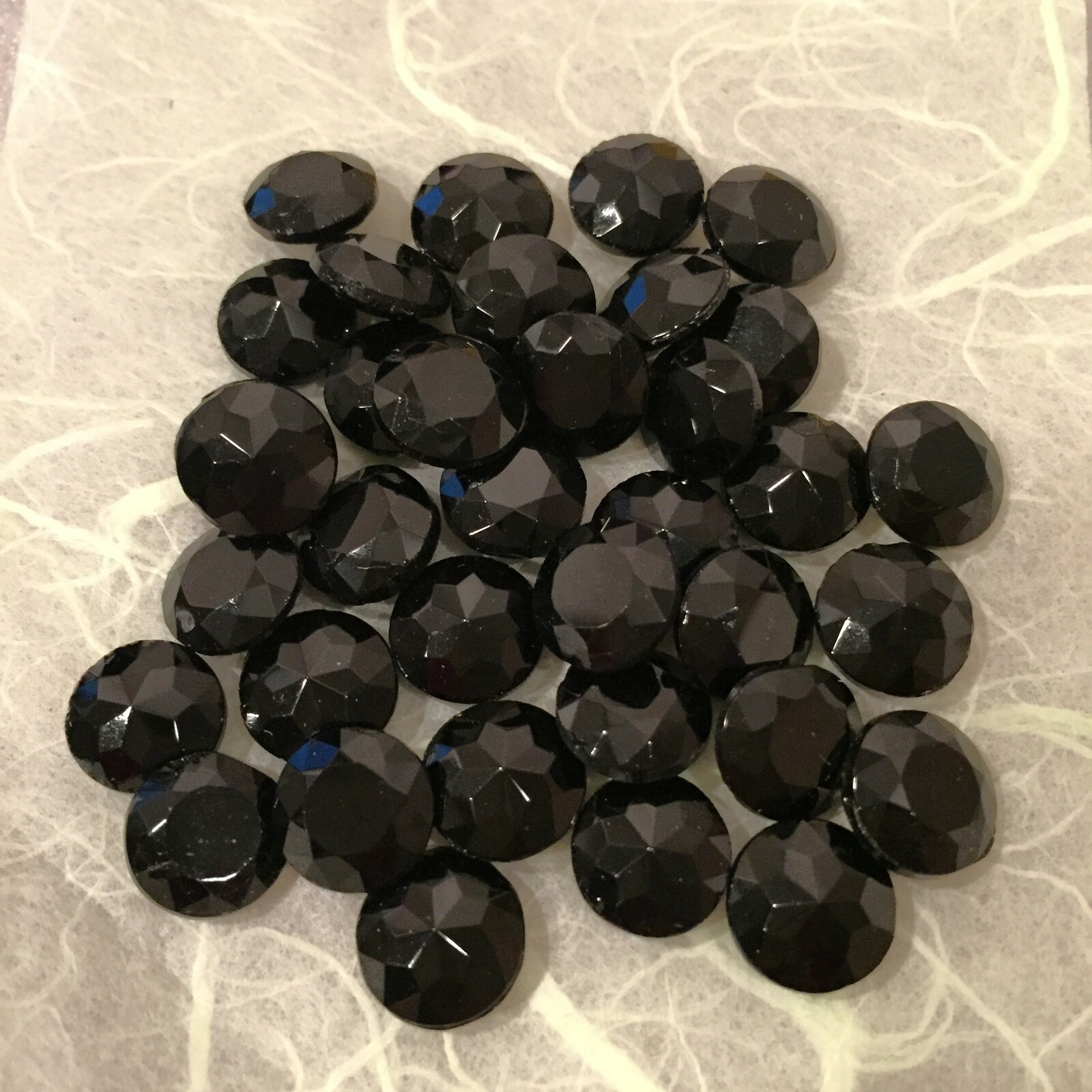 C32 11mm opaque black faceted glass stones, pointed unfoiled back (36)