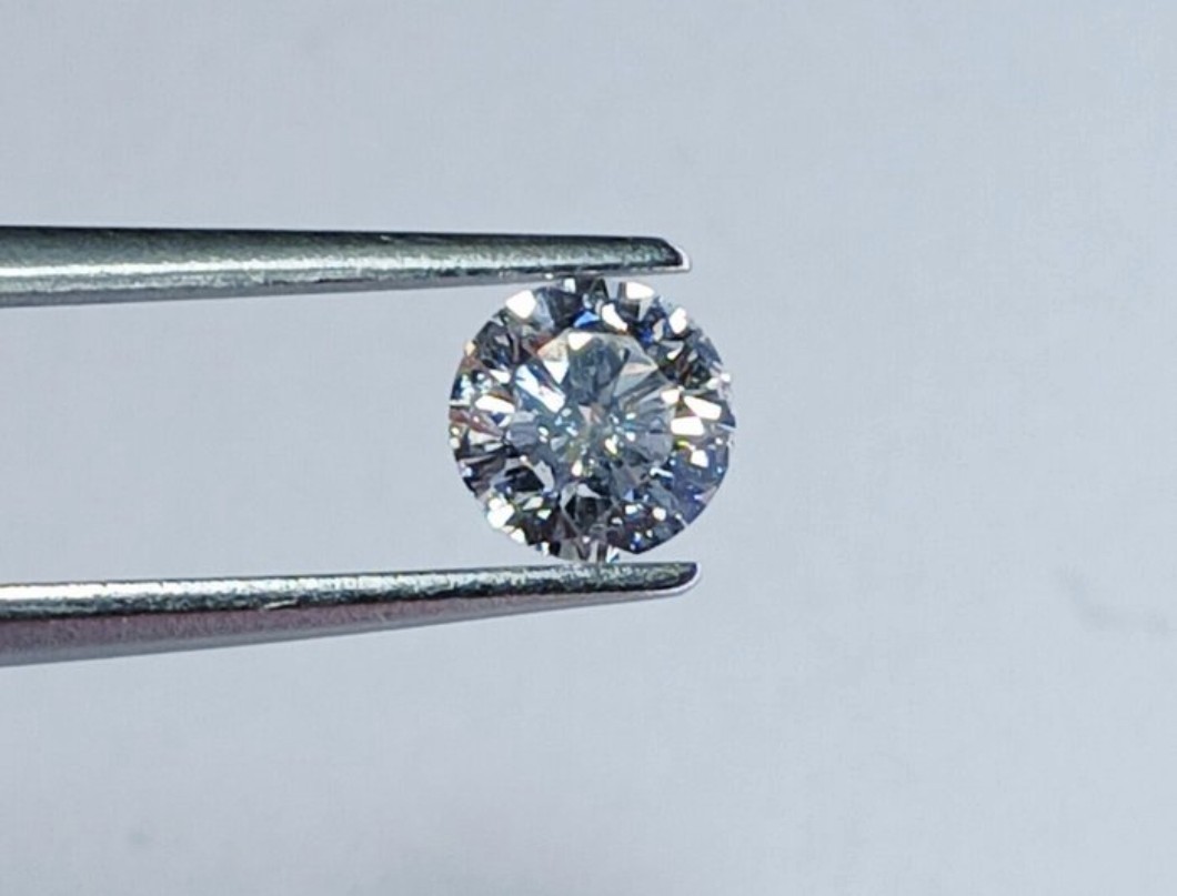 0.61ct Natural Round Brilliant Cut Diamond D SI2 IGI Certified Laser…