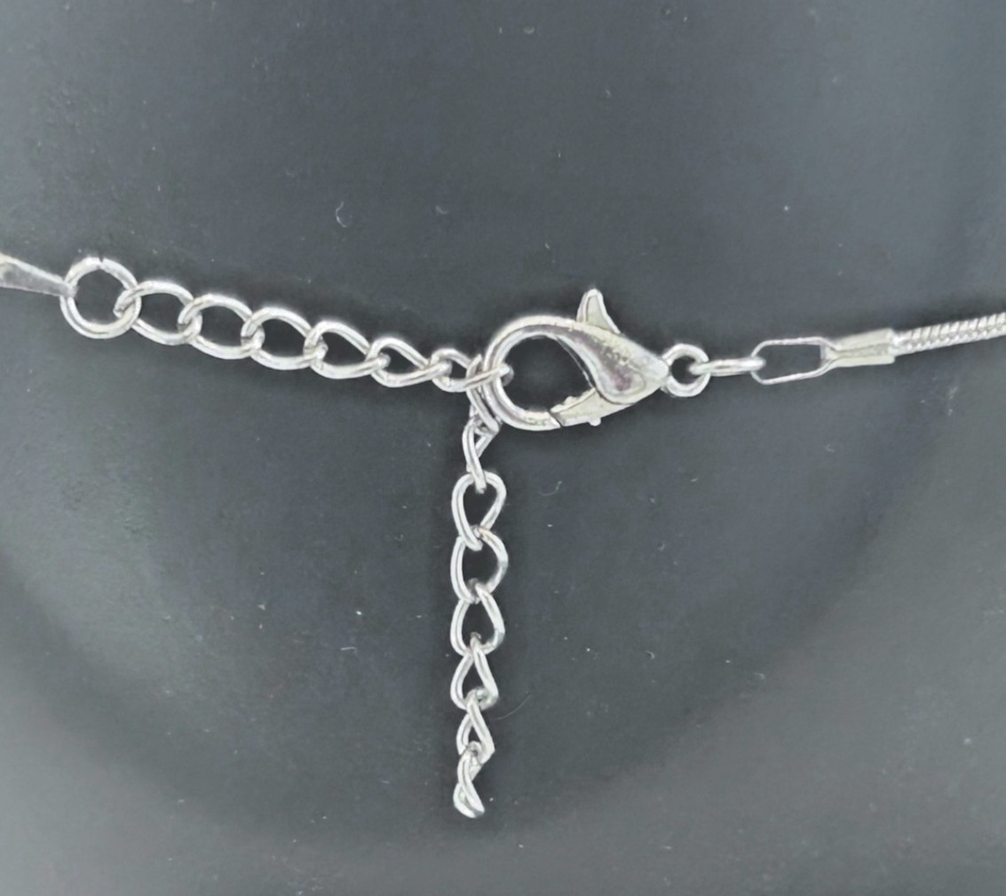 Silver toned Cat pave set with Clear Rhinestones and Dark Stone Eyes Snake Chain