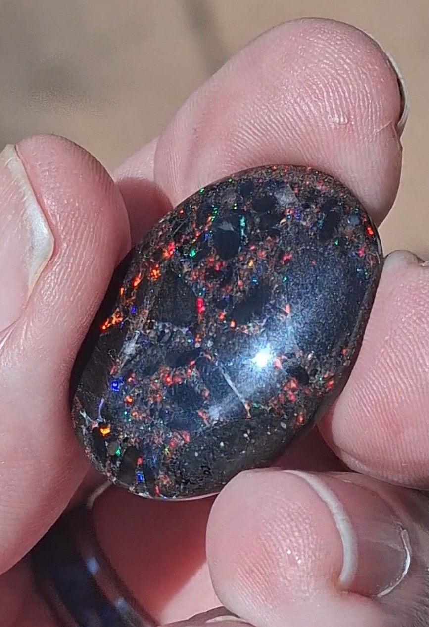 30cts Jundah treated matrix opal. Bright multicolour patterns on both sides