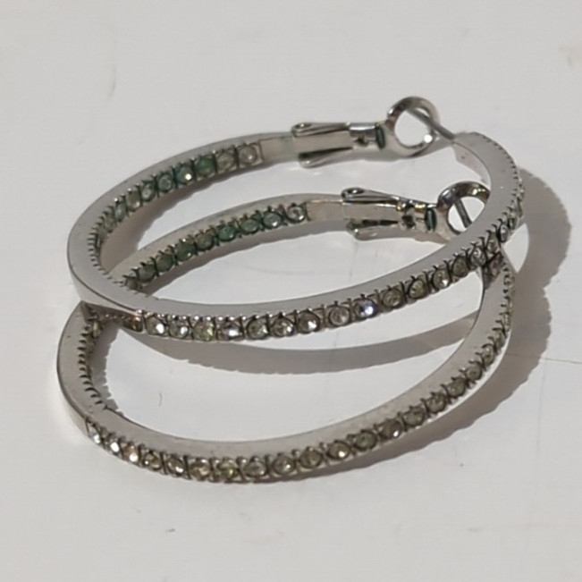 Touchstone Crystal by Swarovski Silver Tone Inside-Out Clear Pavé Hoop Earrings