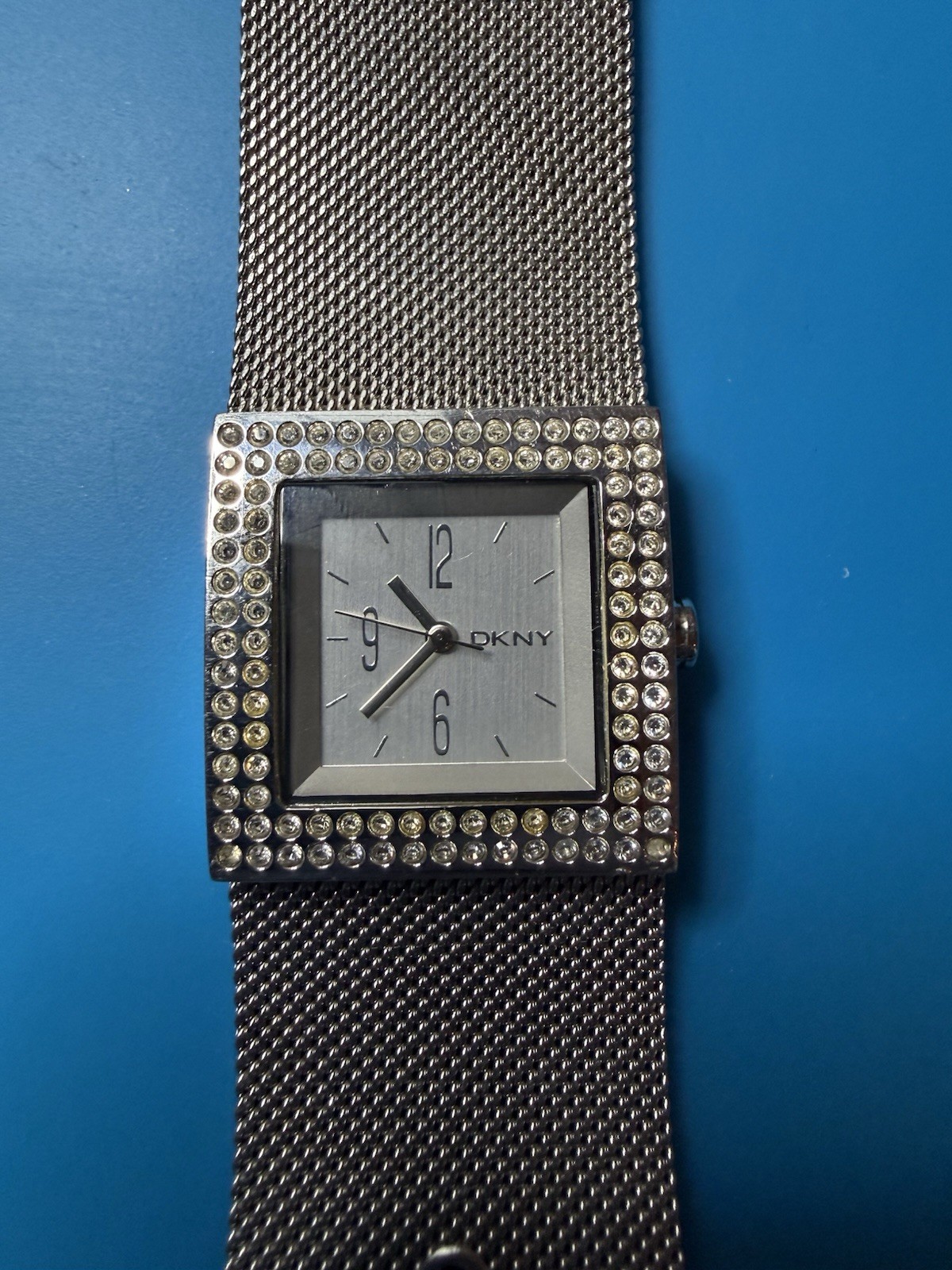 DKNY Women’s Silver Square Dial Mesh Band Quartz Wristwatch 30m