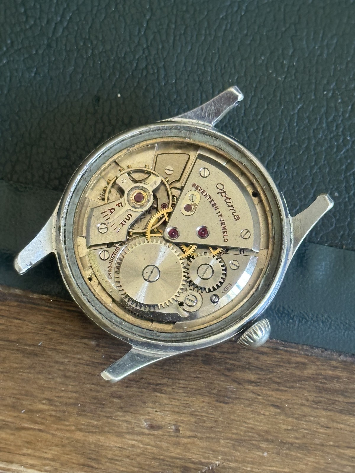 Optima 7010 P Mécanique à remontage manuel vintage Métal avec fond vissé en acie