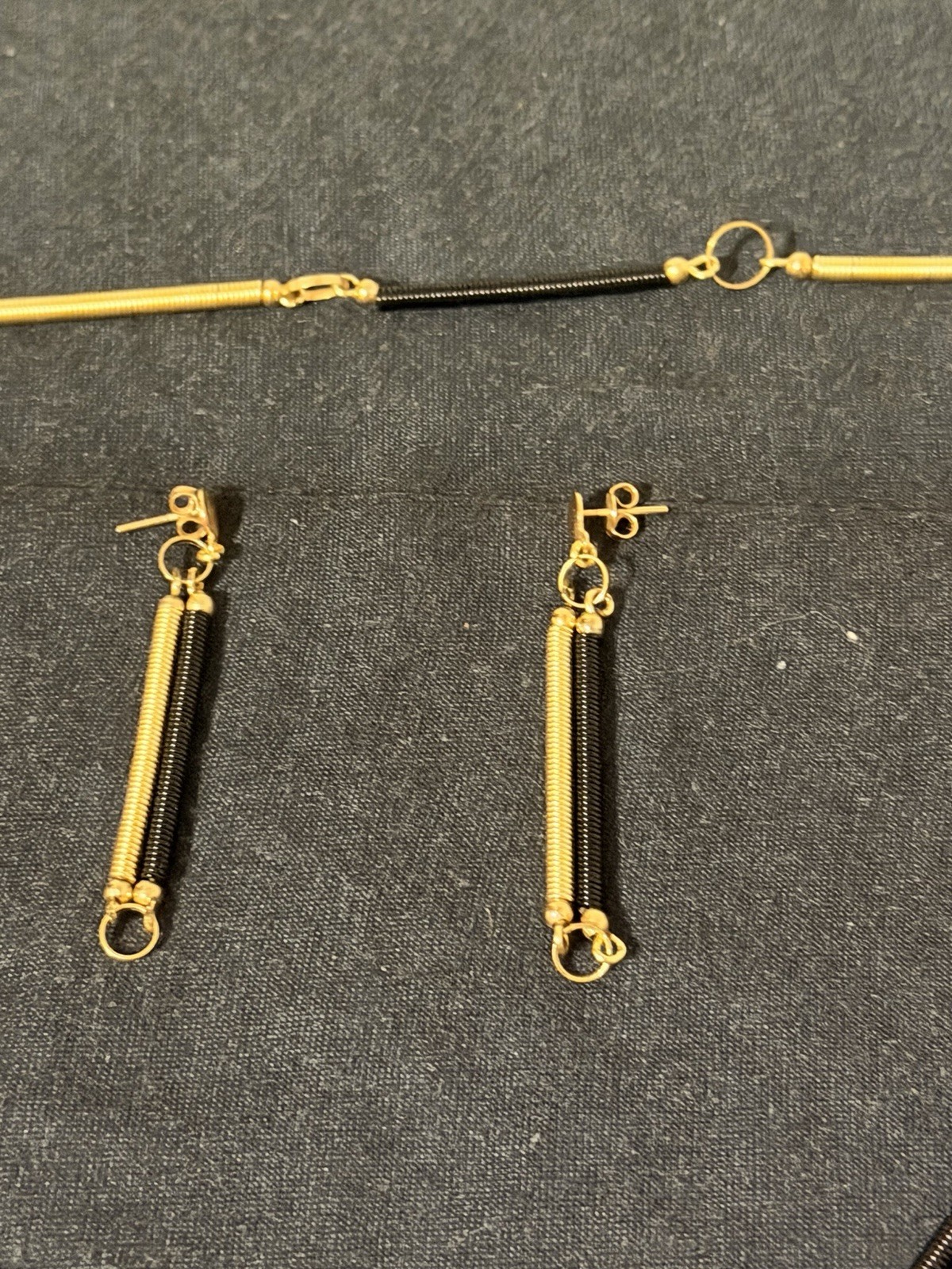 Abstract Gold‑Tone Black Coil Necklace & Earrings Set Modern Industrial Design