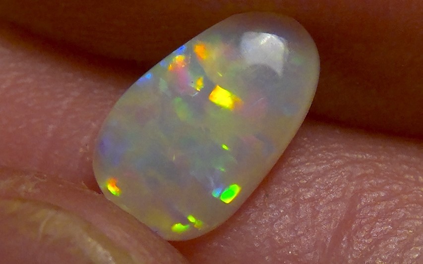 0.87cts Solid Lightning ridge opal, stunning rainbow fire *see video*