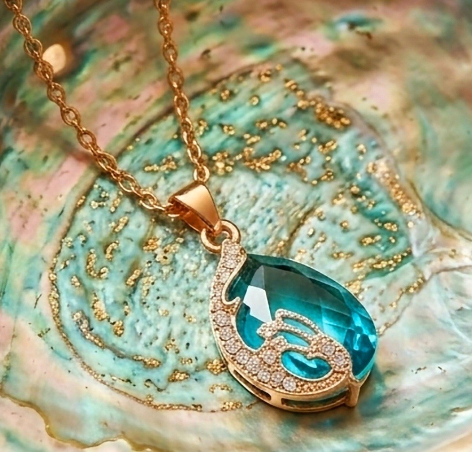 Elegant Teardrop Pendant Necklace – Gold Tone Chain – Sparkling Blue Stone Gift