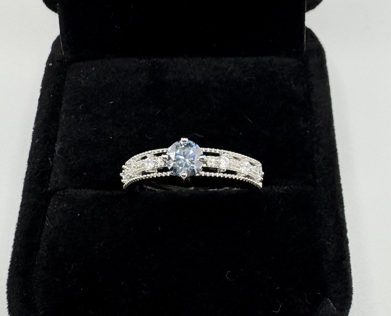 Vintage Style Silvertone Adjustable Ring With Blue CZ Stone