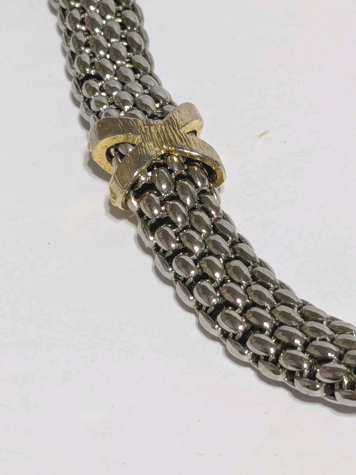 Silver Tone Popcorn Style Chain Necklace With Gold Tone Bow Accents 16″.