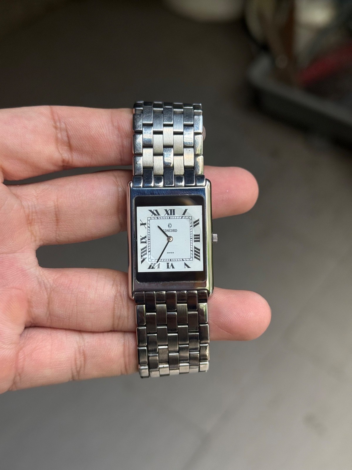 Vintage Concord Swiss Quartz Tank Watch Roman Dial Stainless Steel 26×34.5mm