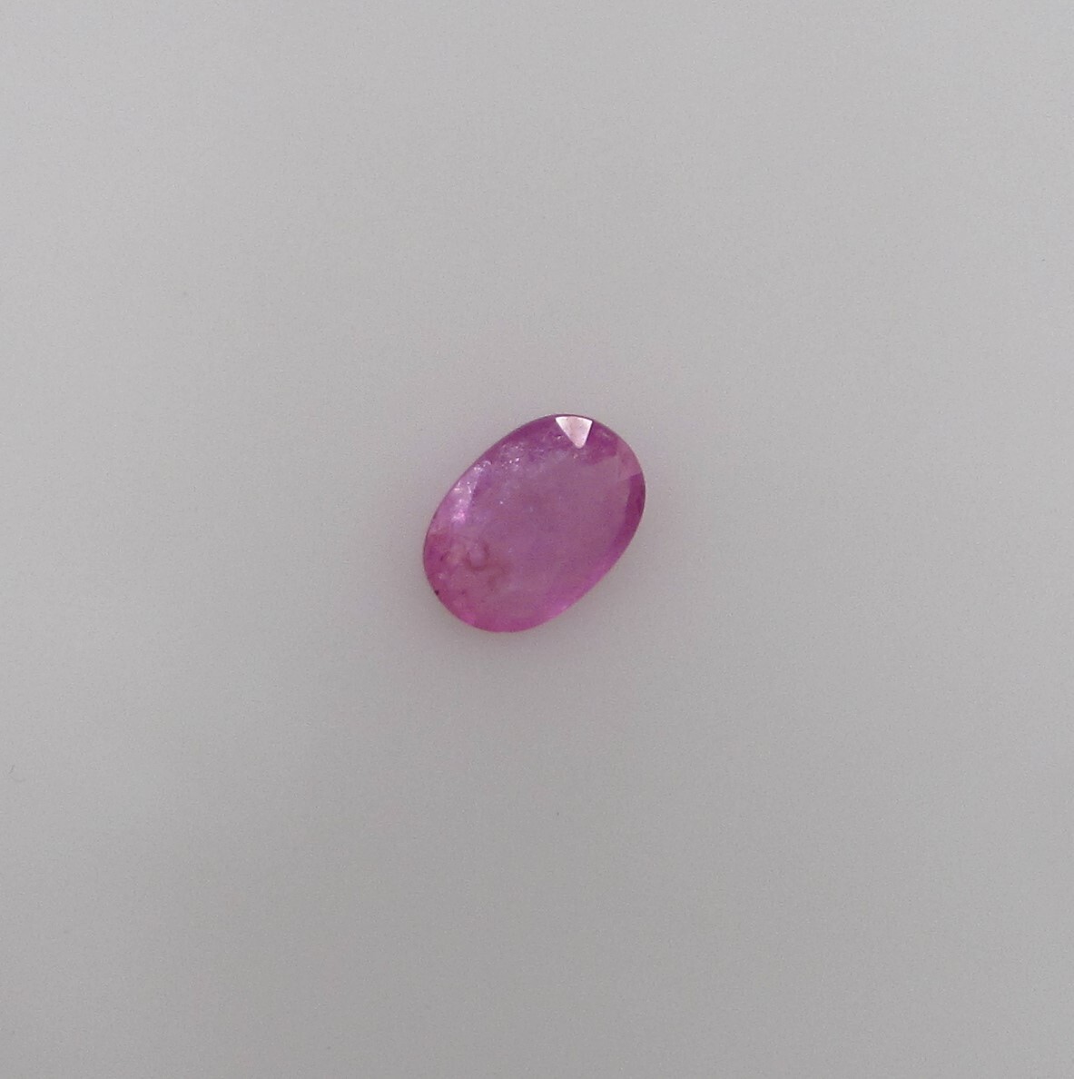 1.34 Carat Medium Pink Sapphire, 8.5 x 4 mm Oval, Very Slightly Included.