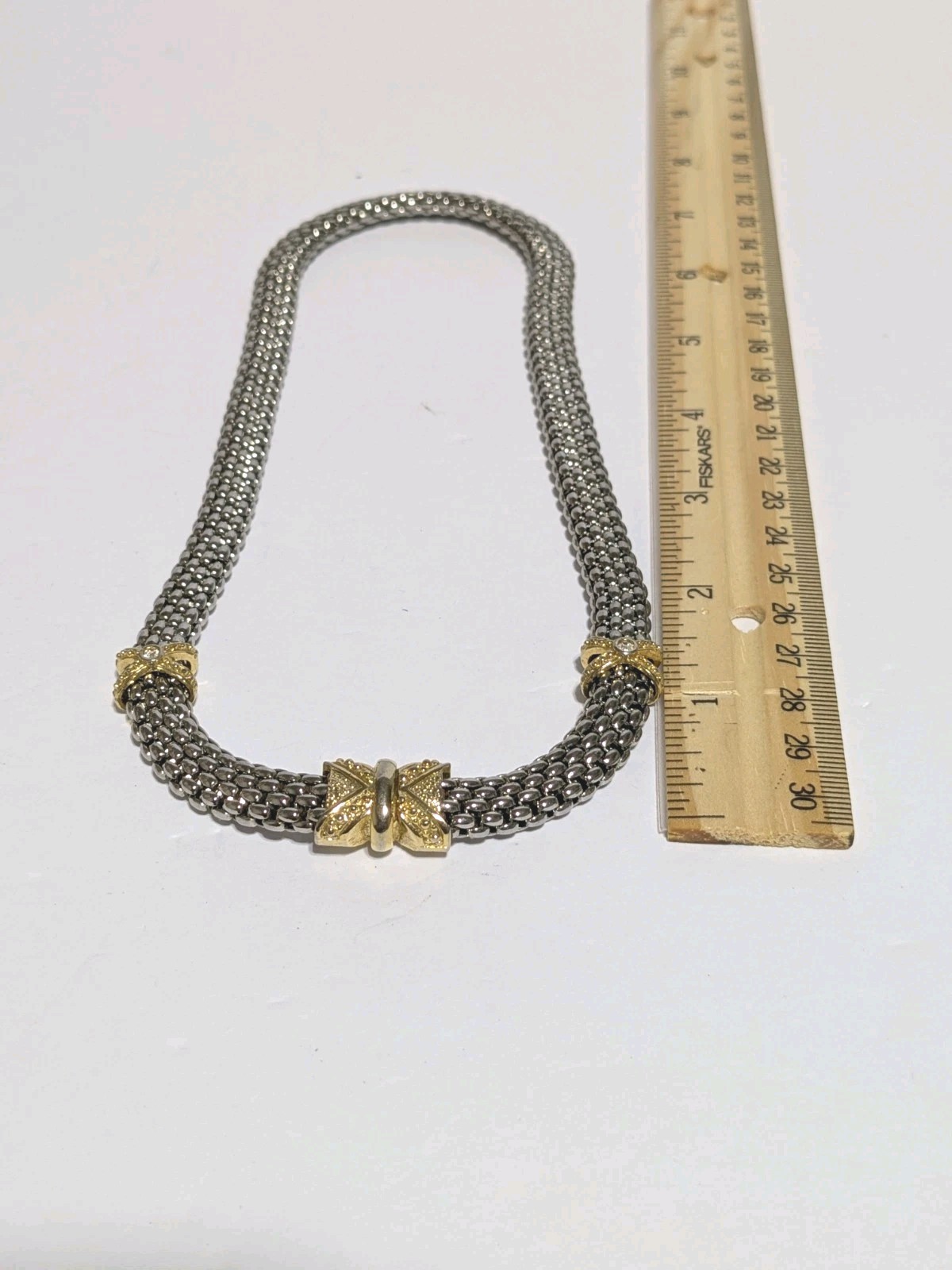 Silver Tone Popcorn Style Chain Necklace With Gold Tone Bow Accents 16″.