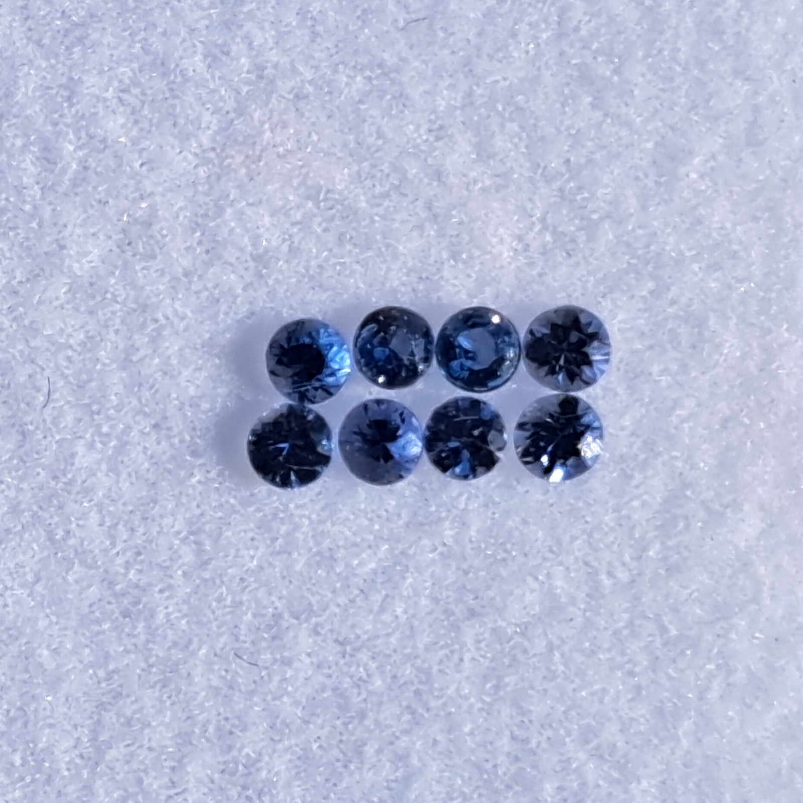 8 Genuine YOGO Montana Sapphires Brilliant Cut Round Ranging 1.9-2.0mm 0.25ctw