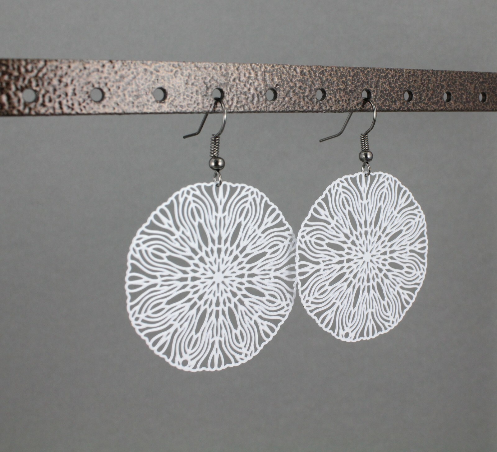 White round earrings cut out flower filigree scroll circle 2 1/8 long very Light