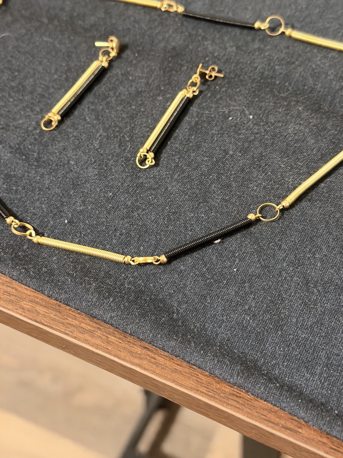 Abstract Gold‑Tone Black Coil Necklace & Earrings Set Modern Industrial Design