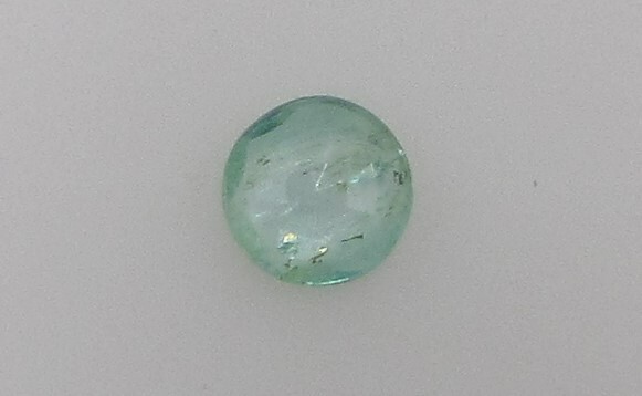 0.46 Carat Green Emerald, 5.6 mm Round, Very Slightly Included. COA