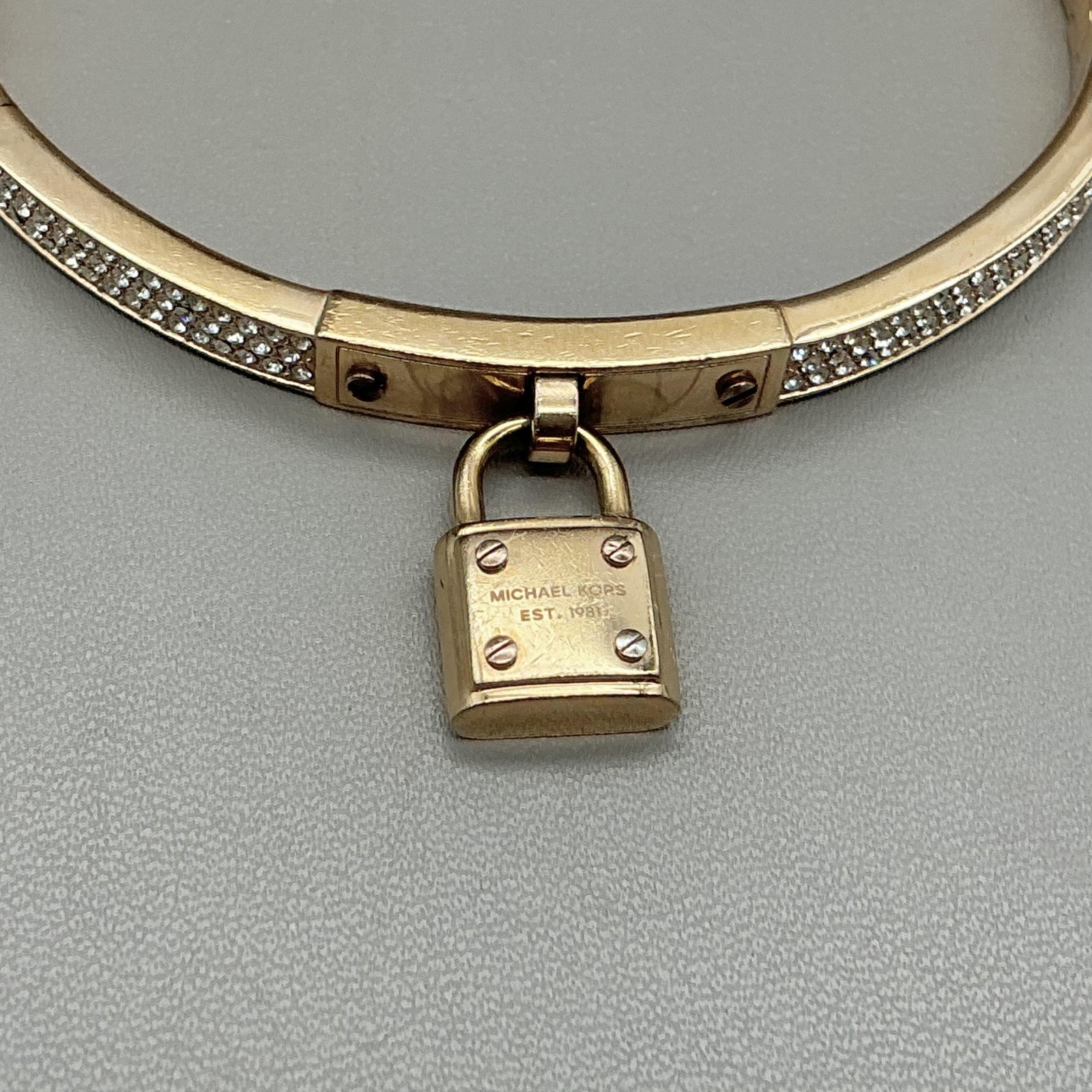 Michael Kors Bracelet Gold Tone Padlock Charm Rhinestone Bangle Womens 7 Inch