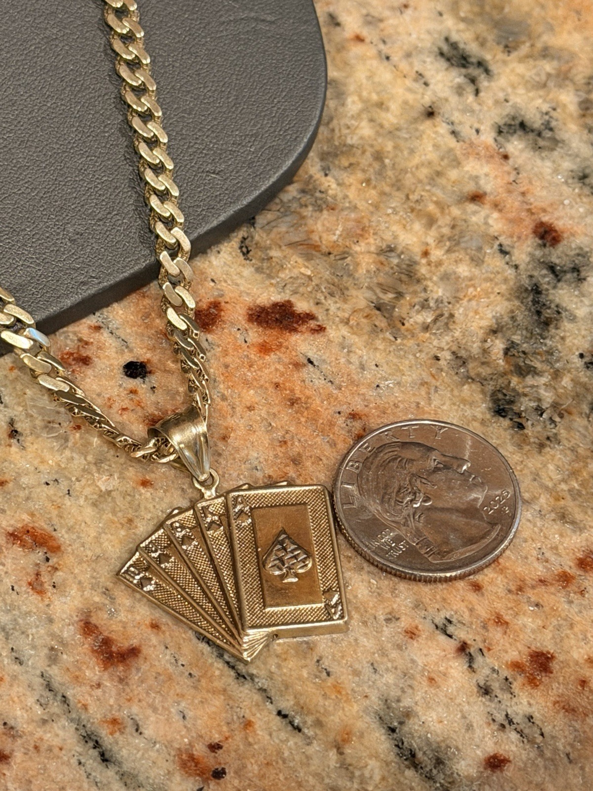 14kt 22″ Cuban 5mm 10.66 grams With 10k Cards Pendant