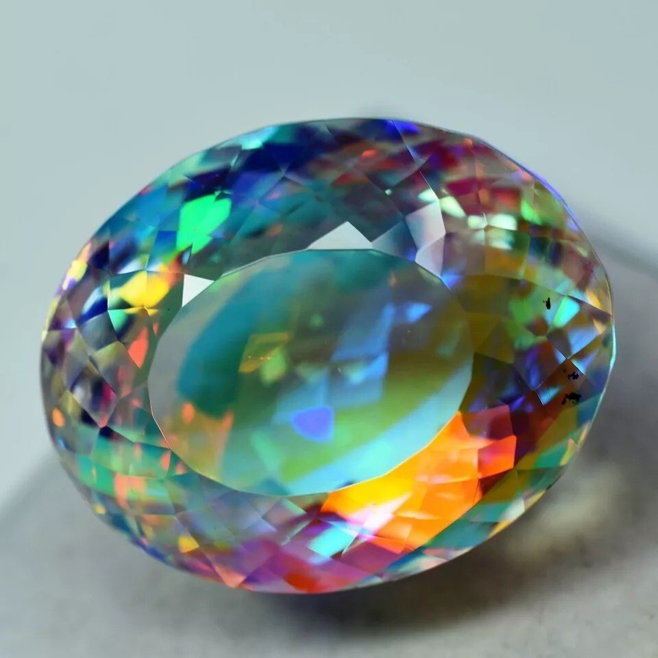 Natural Mystic Topaz Color Oval Cut Certified 69.40 Ct Rainbow Loose Gemstone