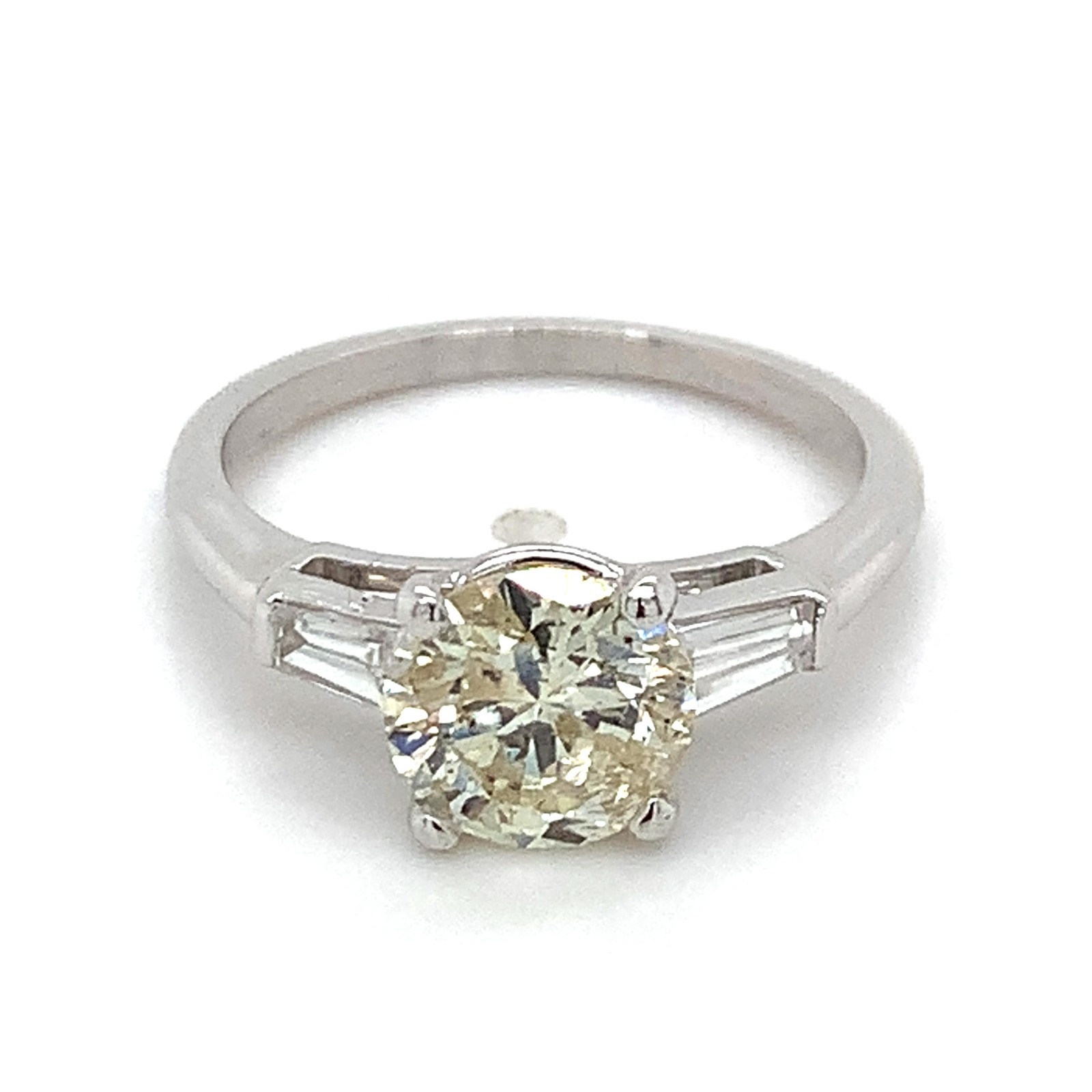 Platinum Light Yellow 1.44CT Round With Tapered Baguette Diamond 3 Stone Ring