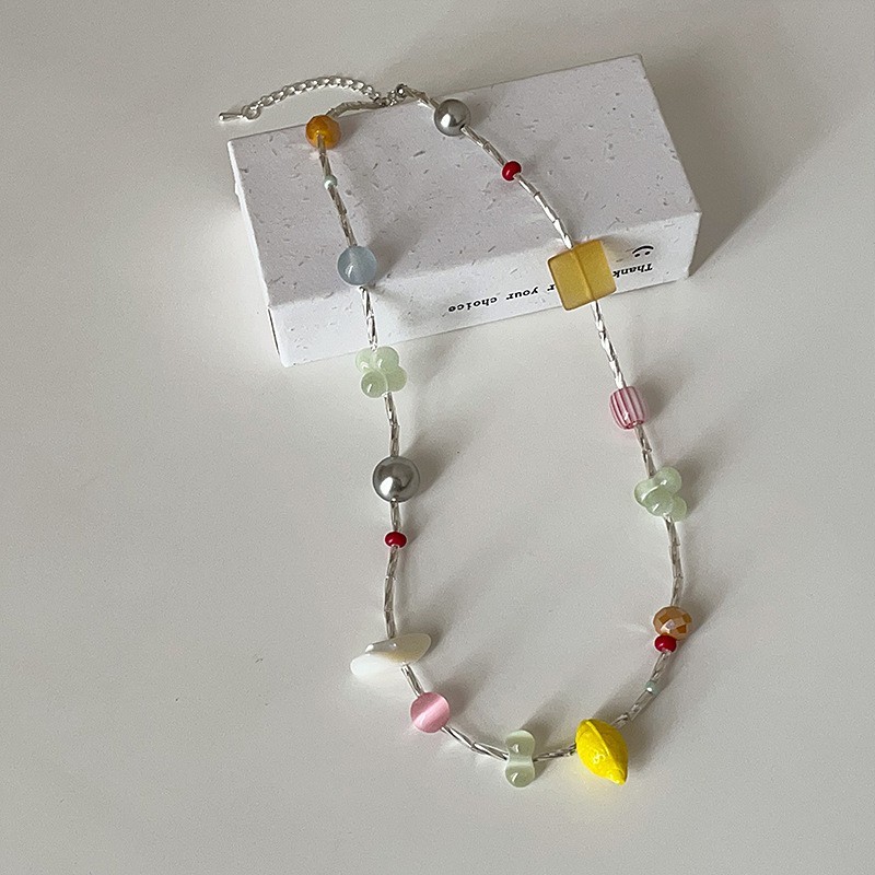 Dopamine-style irregular beaded flower and lemon necklace