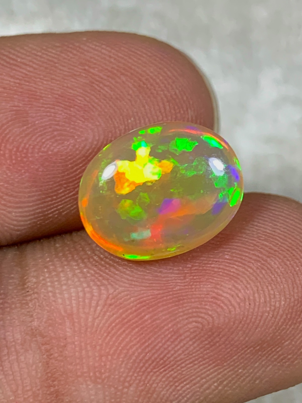 Natural Orange Ethiopian Welo Opal Rare Harlequin Pattern 4 Carats Oval Cabochon