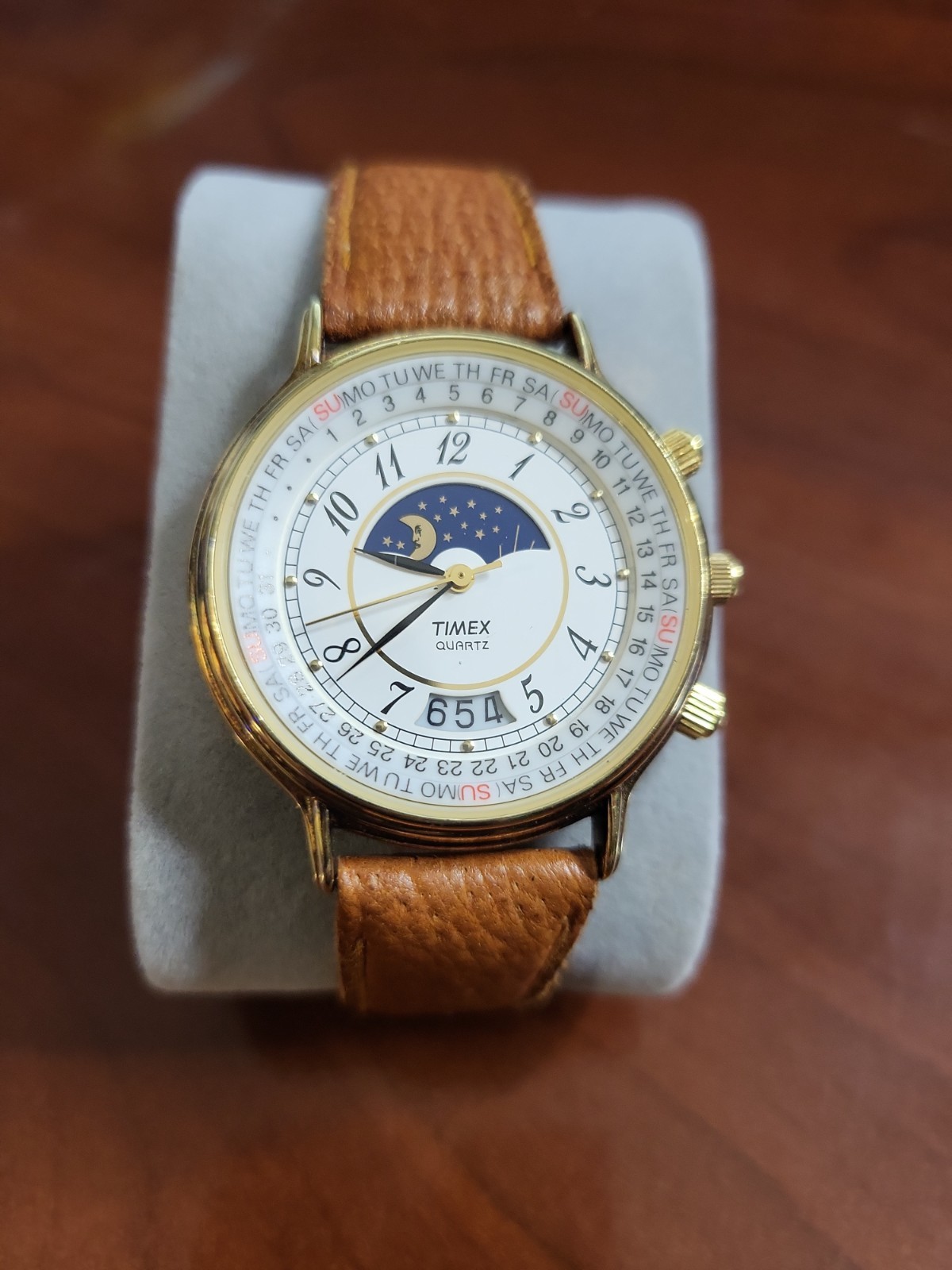 Vintage Timex 364 T Cell gold-tone Quartz Watch featuring a sun and moon phase