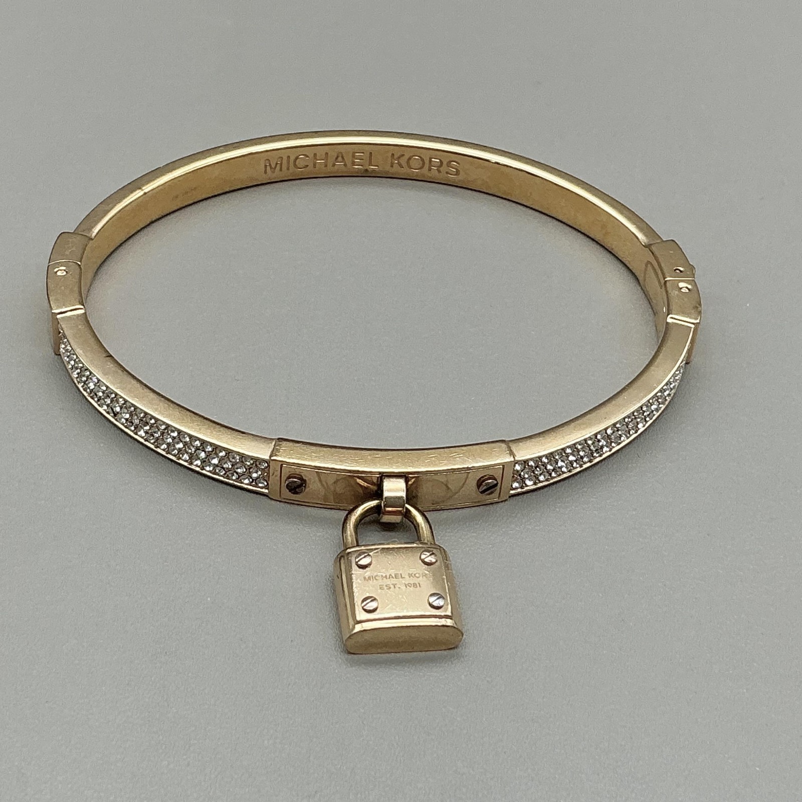 Michael Kors Bracelet Gold Tone Padlock Charm Rhinestone Bangle Womens 7 Inch
