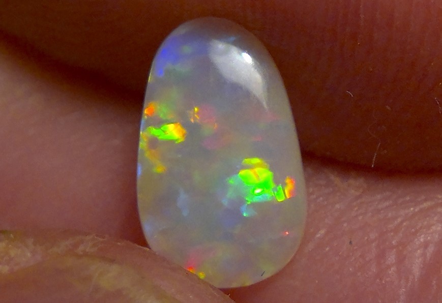 0.87cts Solid Lightning ridge opal, stunning rainbow fire *see video*