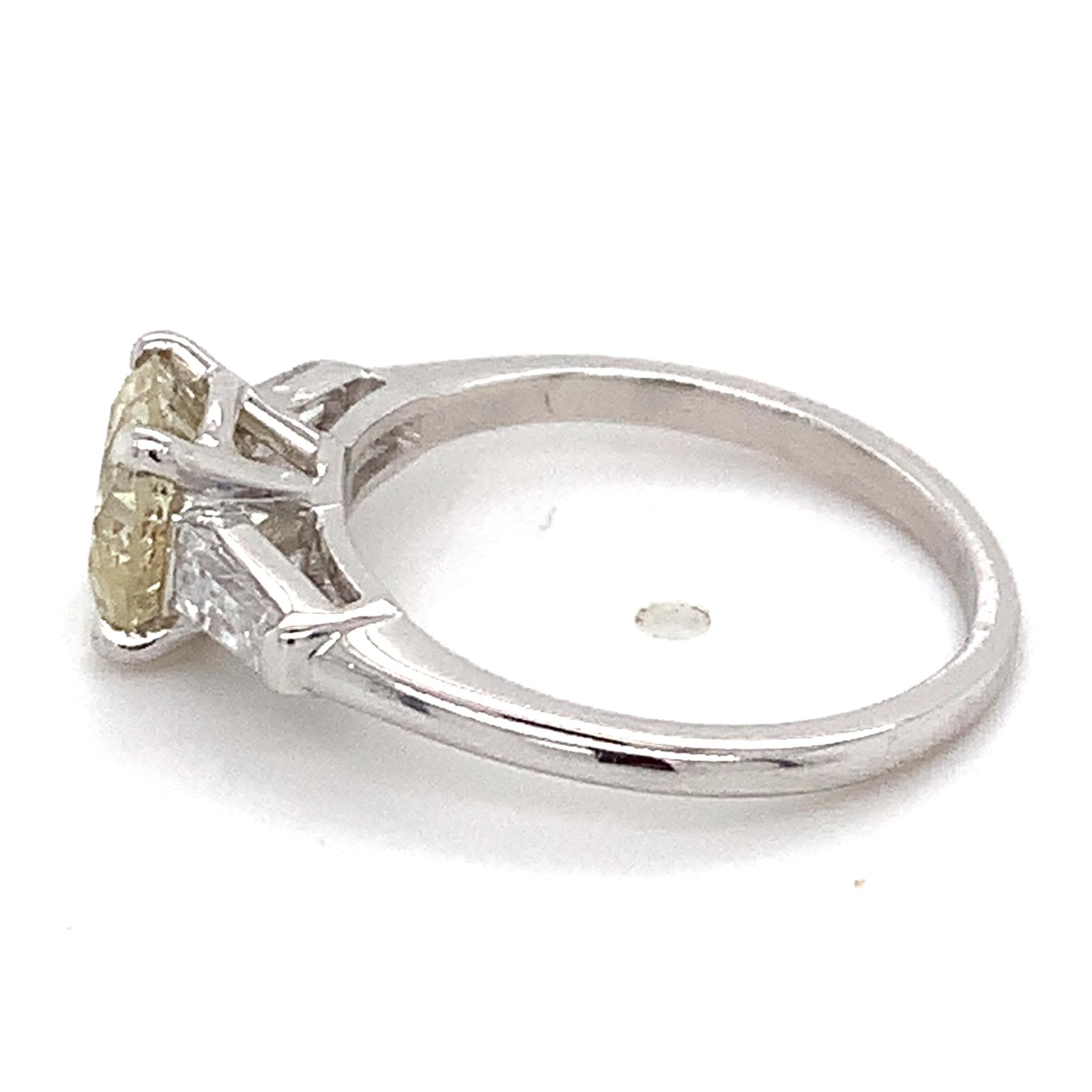 Platinum Light Yellow 1.44CT Round With Tapered Baguette Diamond 3 Stone Ring