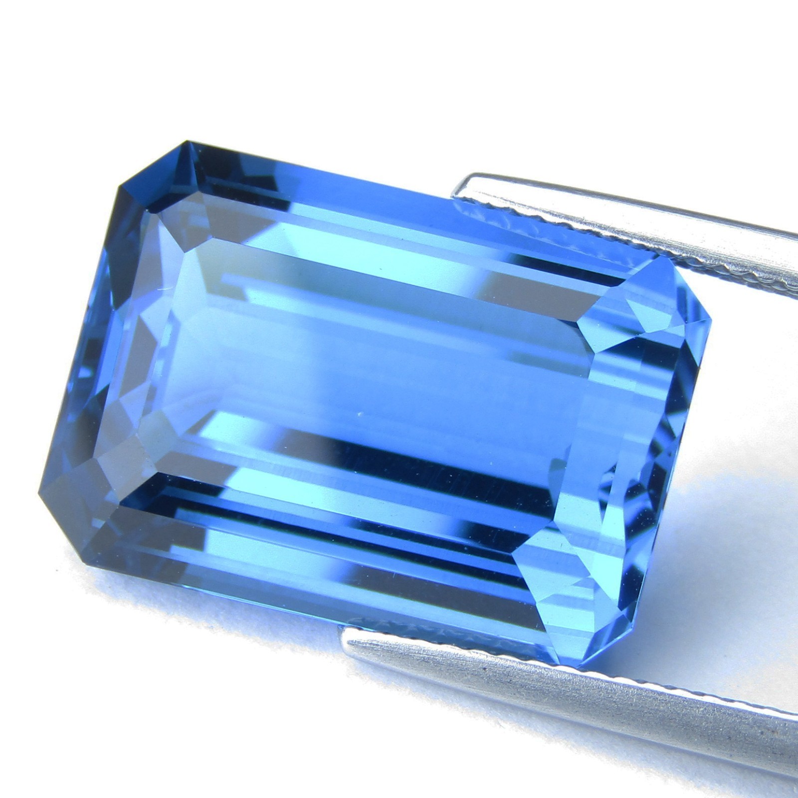 22.44Cts Glorious Natural Top Swiss Blue Topaz Emerald Cut Loose Gemstone
