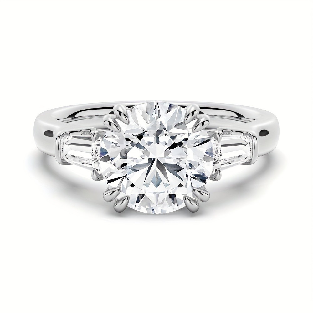 White Silvery 1.5CT Moissanite Round Engagement Ring With Tapered Baguette Side