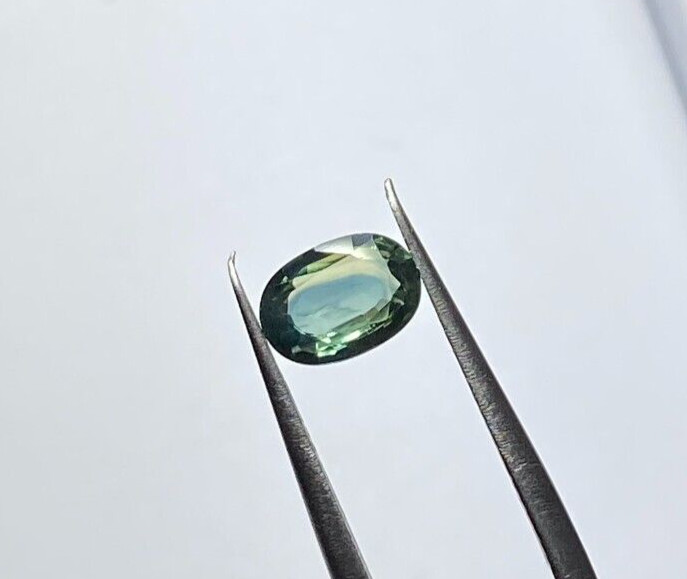 0.82 CTS HEATED MADAGASCAR BLUE/GREEN SAPPHIRE, OVAL CUT 6.5 X 5 X 2.8 MM VVS