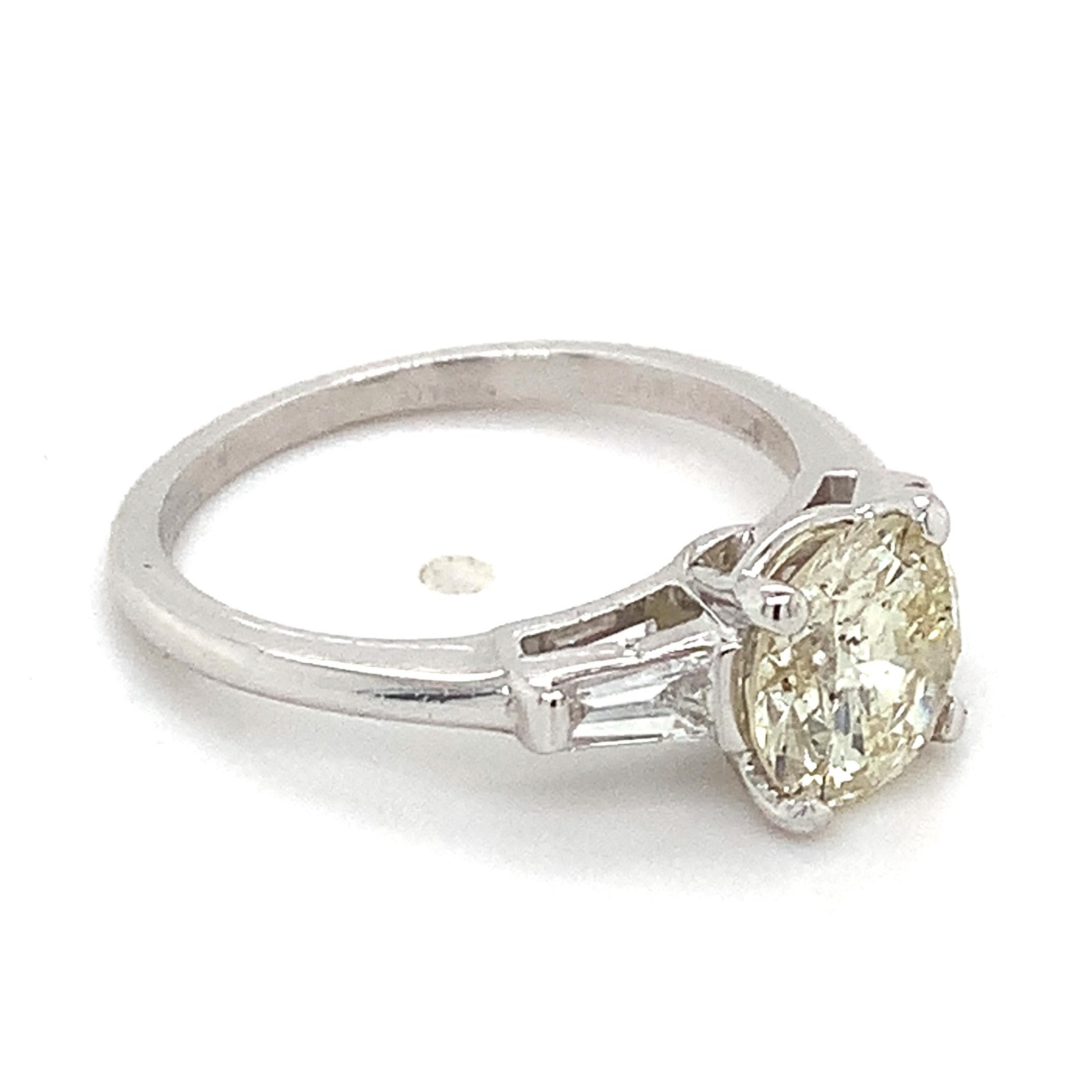 Platinum Light Yellow 1.44CT Round With Tapered Baguette Diamond 3 Stone Ring
