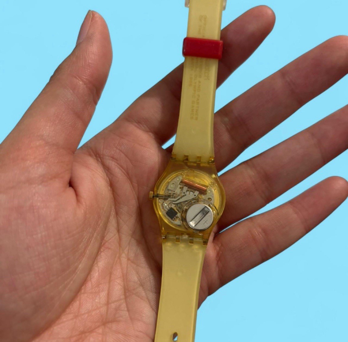 Swatch Moscow 1980 Olympics Quartz Analog Watch 25mm 30m Gold/Red Strap