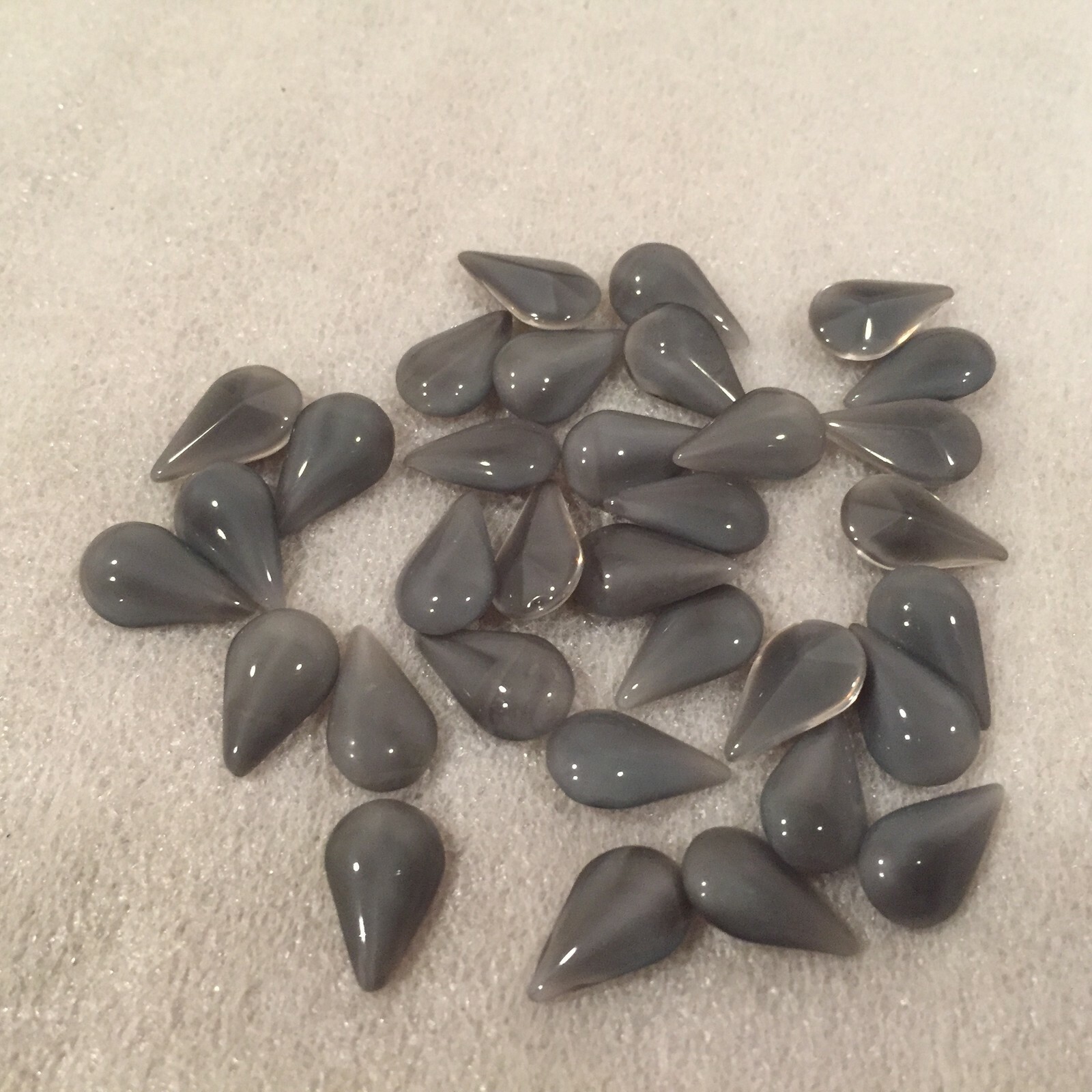 ER73 13x8mm stormy grey moonstone pear glass jewels,curved top,faceted back (24)