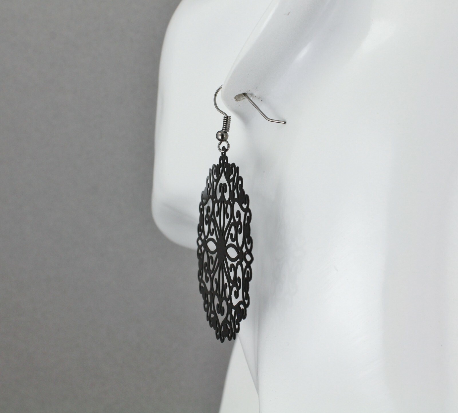 Black round earrings cut out lace filigree scroll circle 2.5″ long very Light