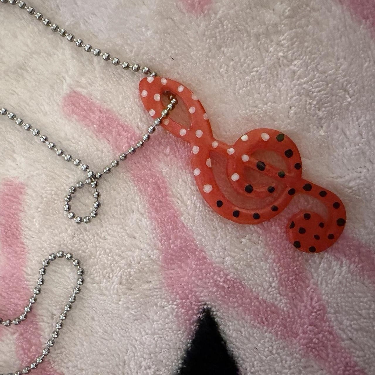 Handmade red treble clef charm necklace with black and white polkadots