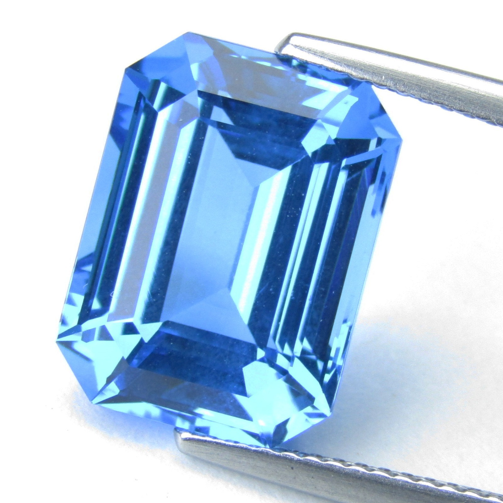 11.13Cts Ravishing Natural Swiss Blue Topaz 14.1×10.5×7.9mm Emerald Cut Gemstone