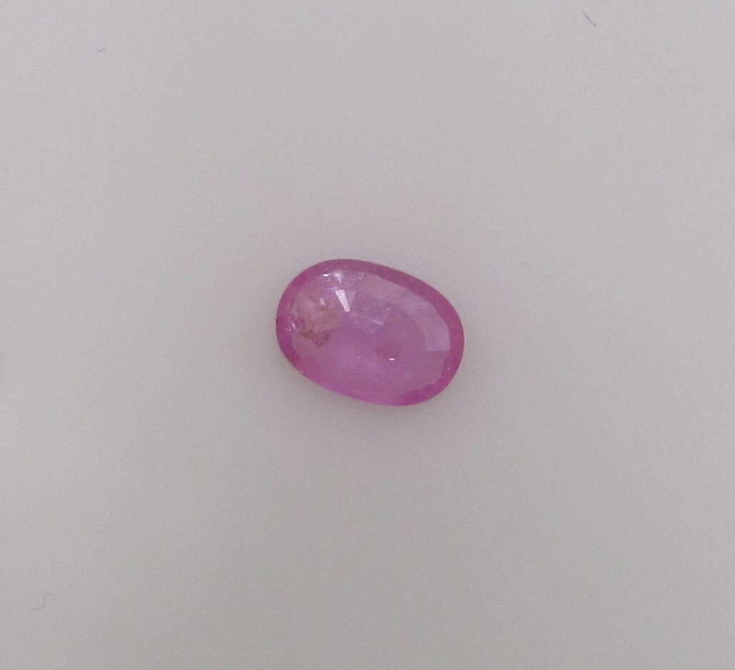 1.34 Carat Medium Pink Sapphire, 8.5 x 4 mm Oval, Very Slightly Included.