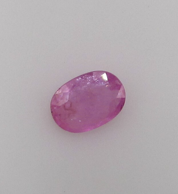 1.34 Carat Medium Pink Sapphire, 8.5 x 4 mm Oval, Very Slightly Included.