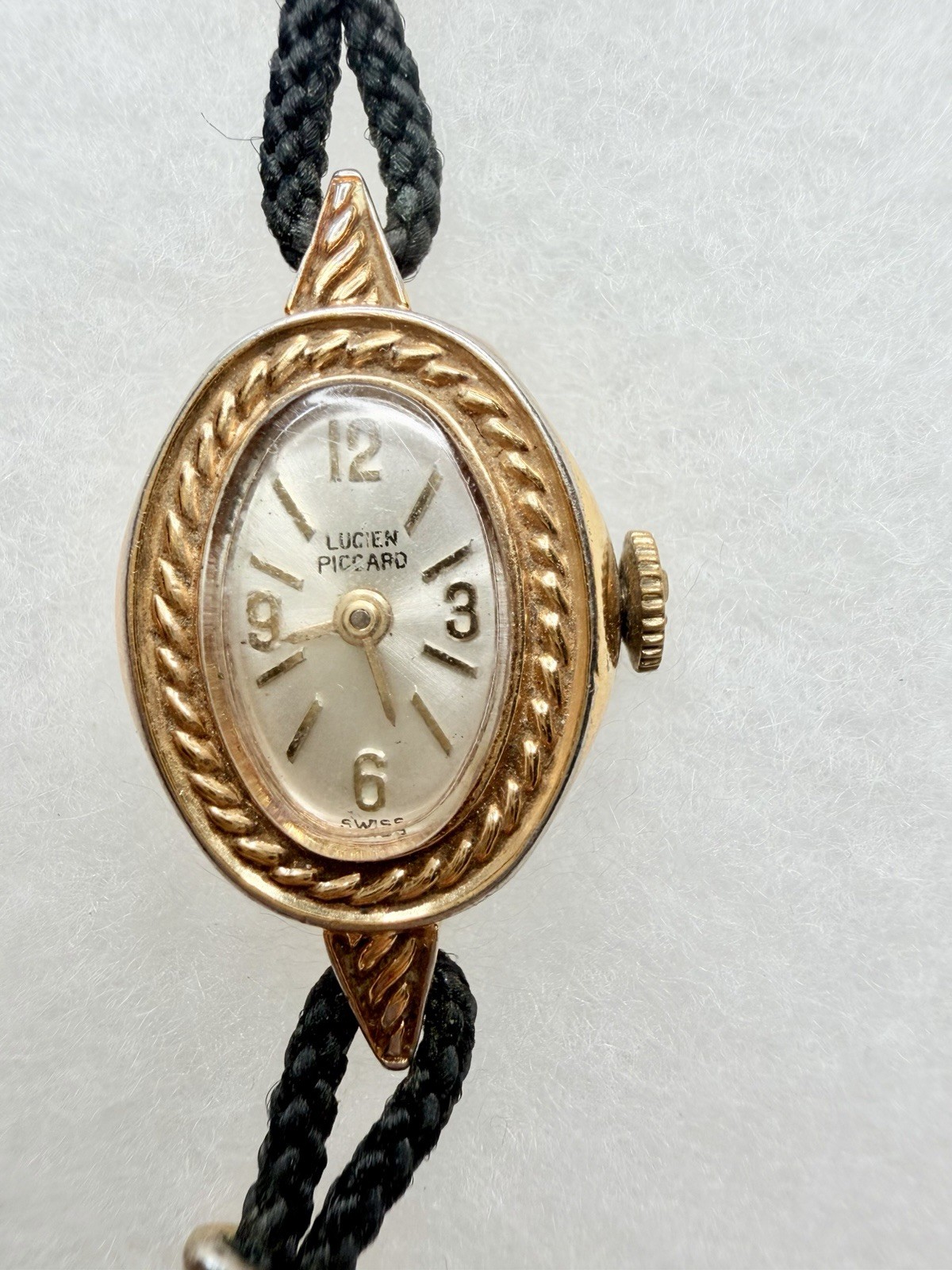 Lucien Piccard Swiss Made Vintage Oval Manual Wind Watch Gold Case Black Strap